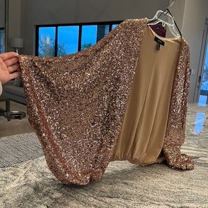 Women’s rose gold, sequined jacket.